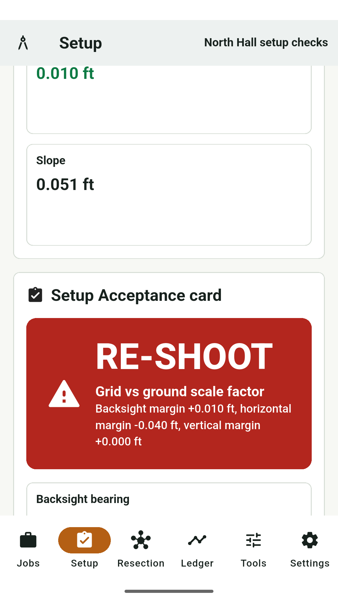 Setup screen with residual tiles and a RE-SHOOT acceptance card